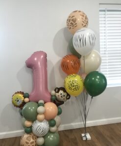 Safari theme number stack paired with helium bouquet